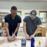 Columbia Bassett program participants make pottery together during planned event in update New York.